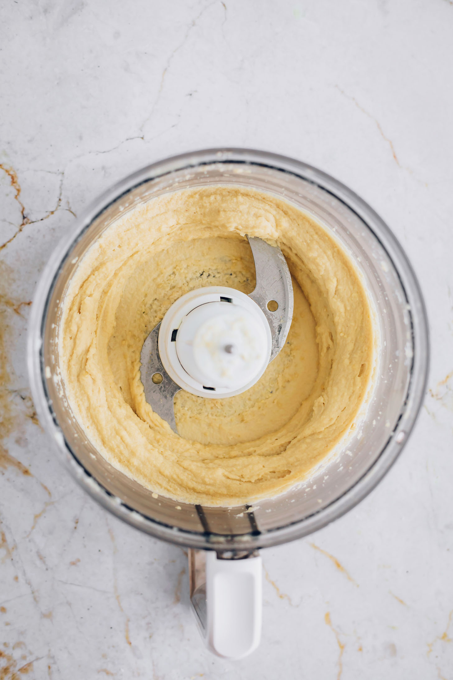 Food processor of vegan cashew ricotta cheese