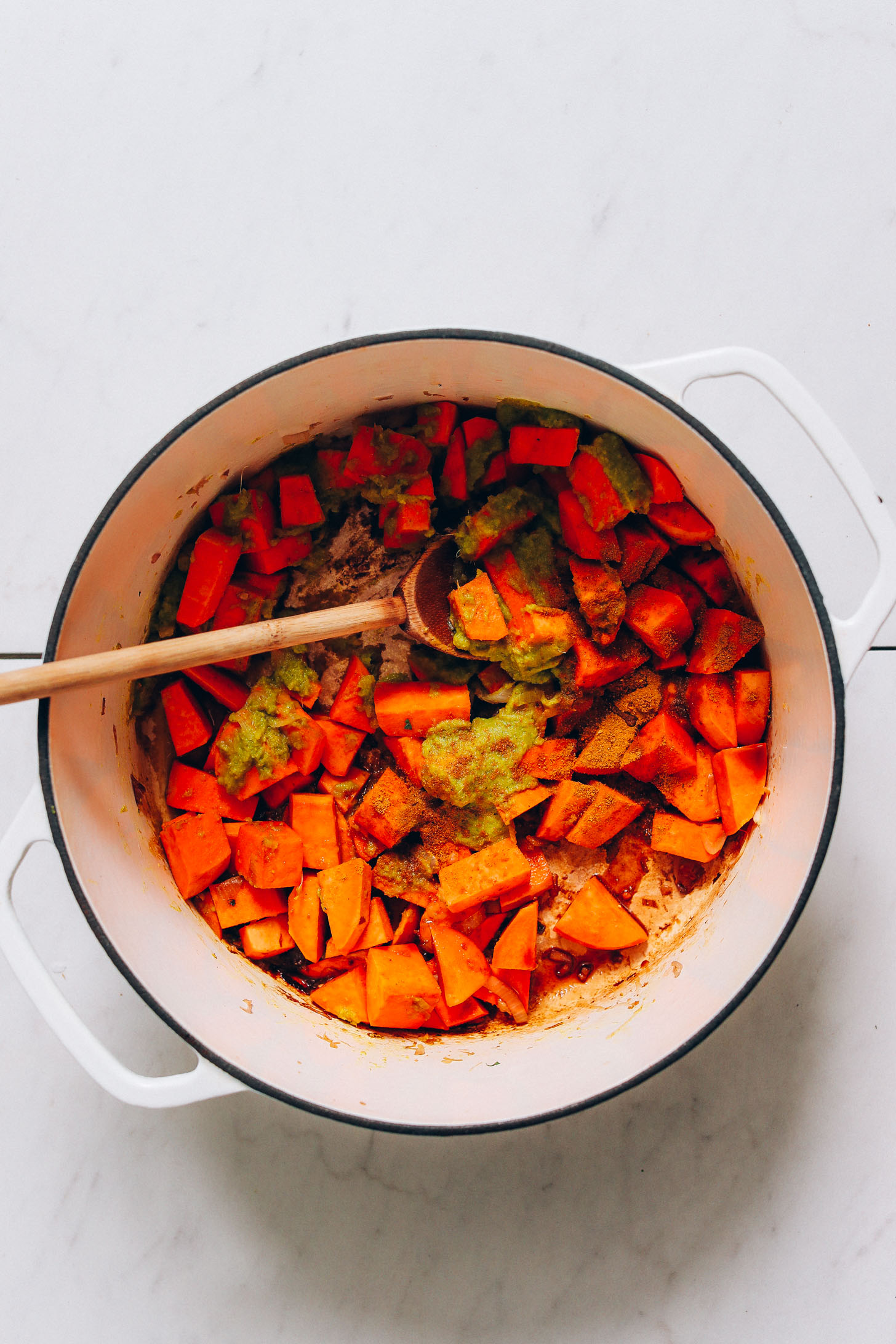 Sautéed shallot, garlic, sweet potato, green curry paste, and sweet potatoes