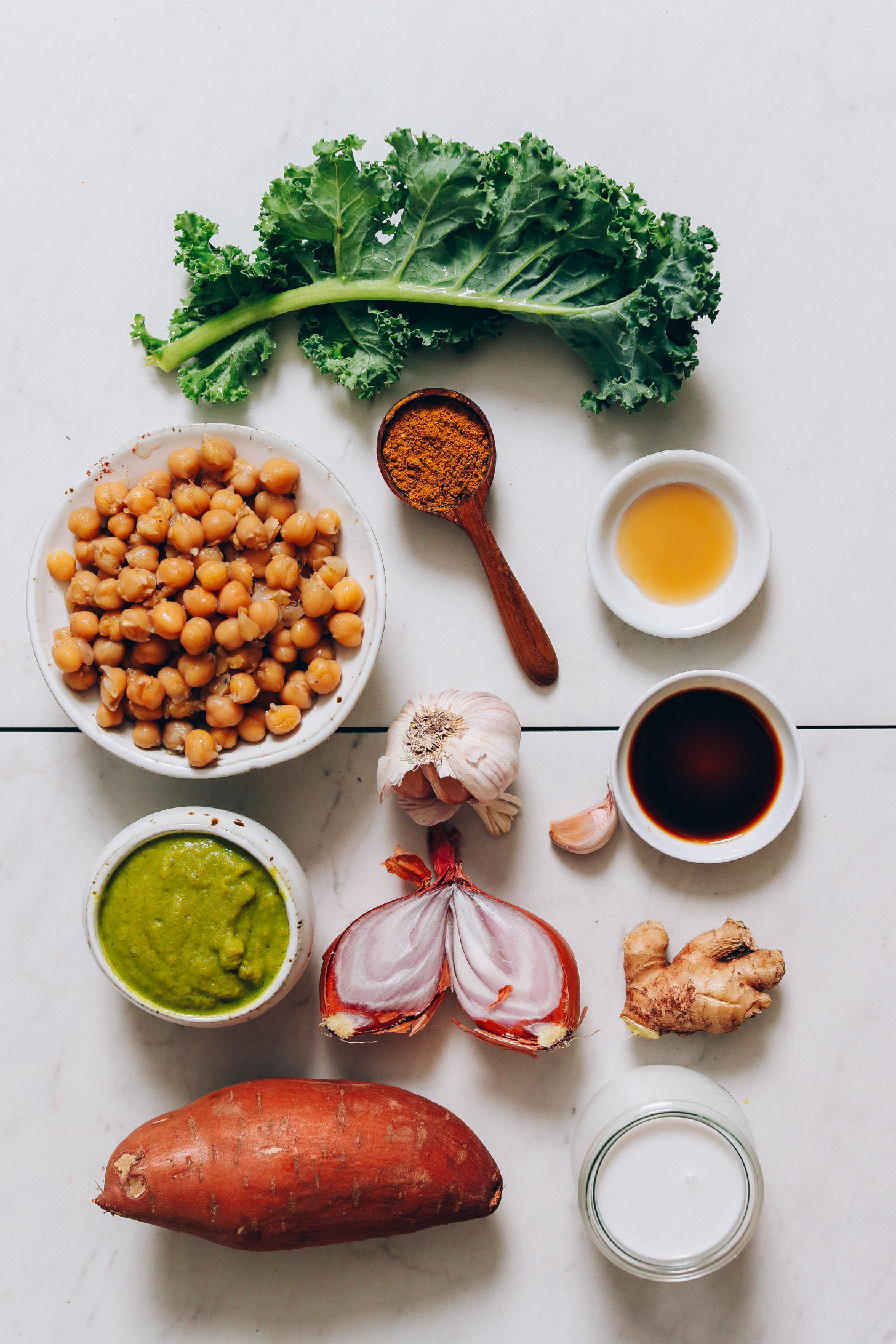 Kale, chickpeas, curry powder, green curry paste, garlic, shallot, ginger, sweet potato, coconut milk, coconut aminos, and maple syrup