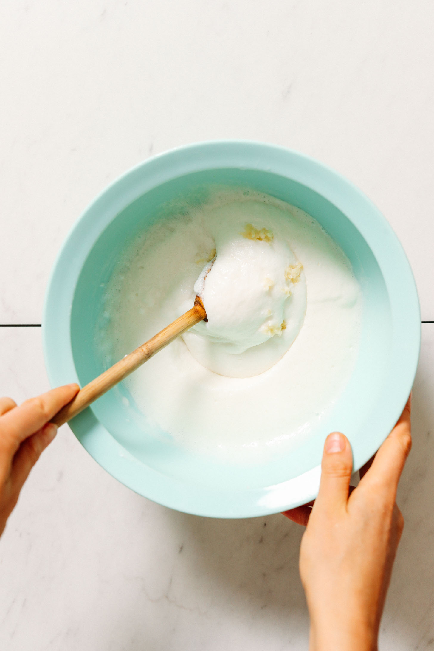 Bowl of foamy naan batter