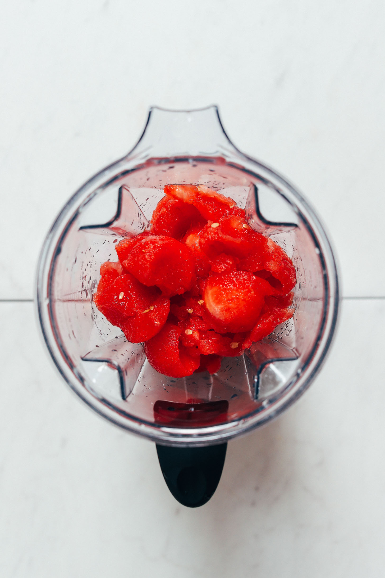 Showing how to make watermelon juice in a blender