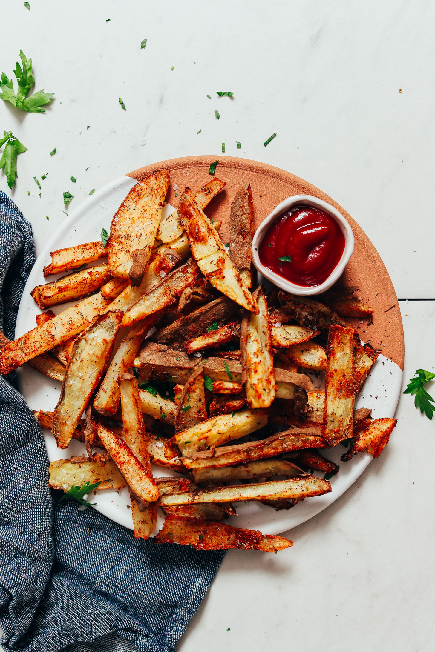 Crispy baked cajun fries with ketchup