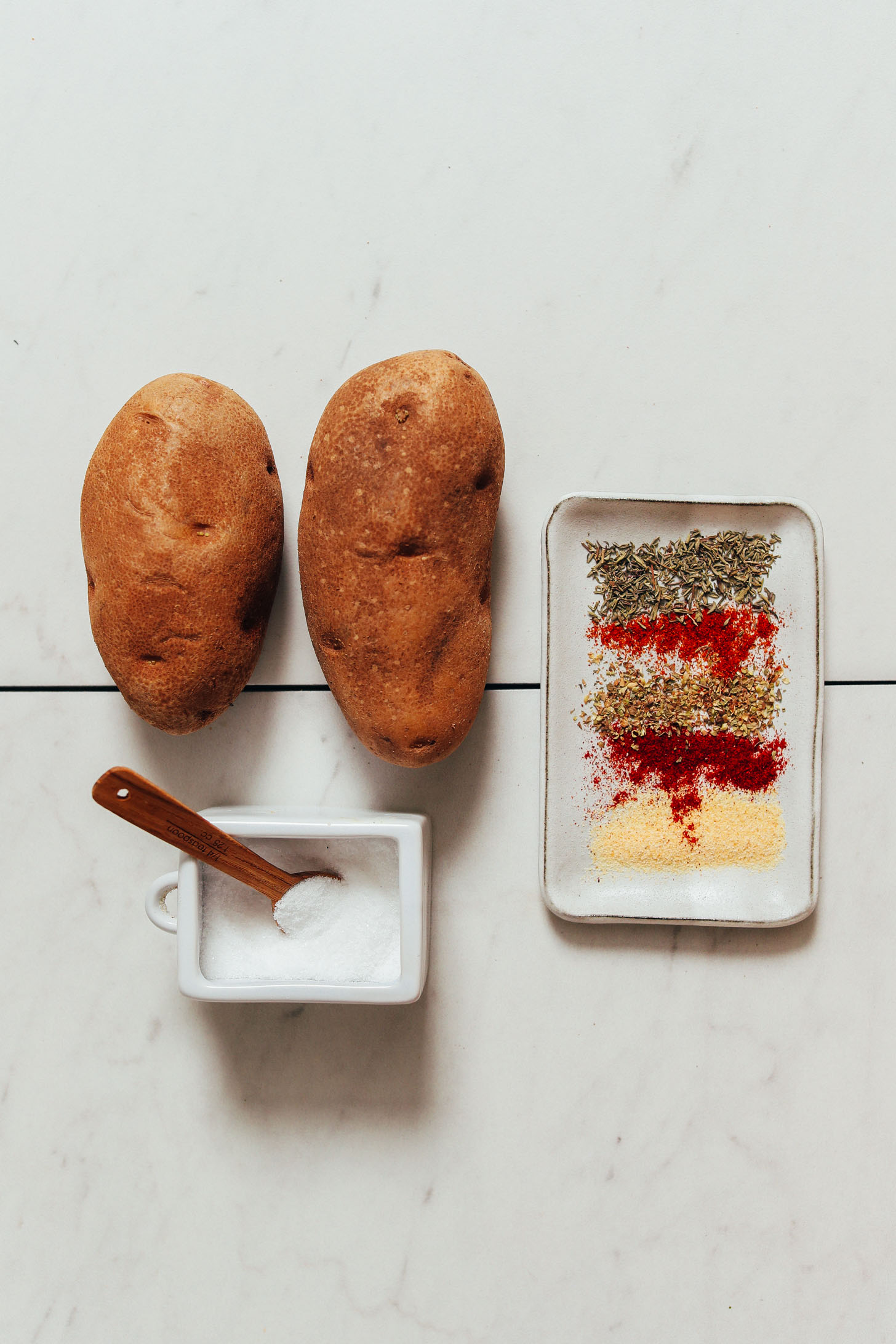 Russet potatoes, salt, and cajun spices