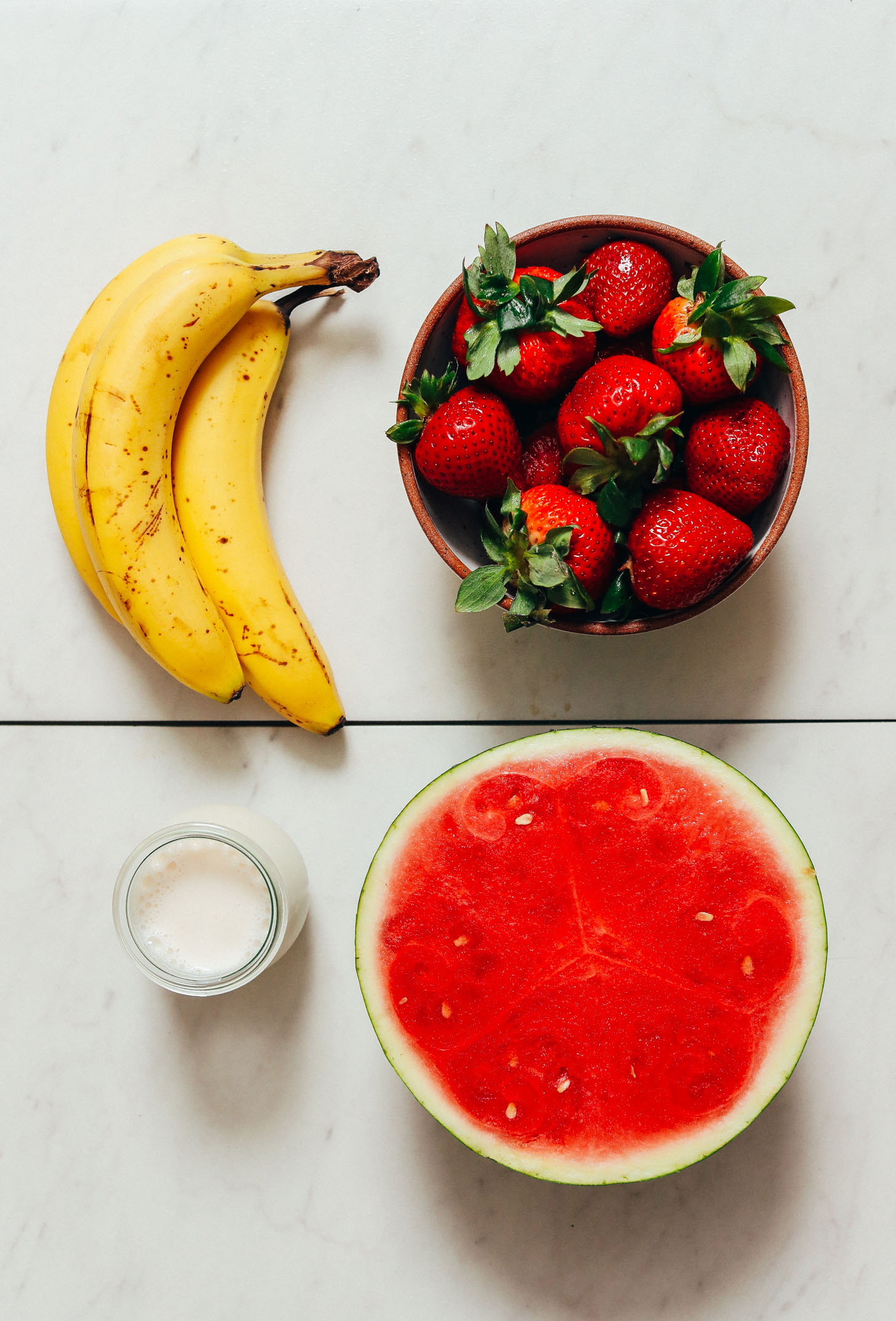 Bananas, strawberries, watermelon, and almond milk