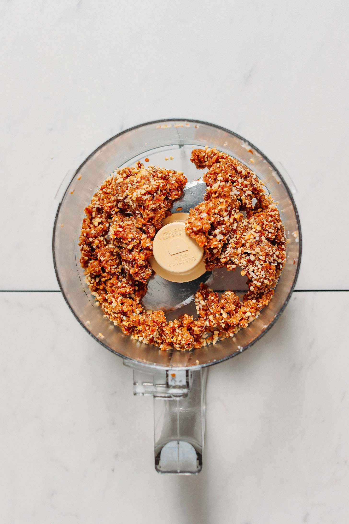 Food processor of Salted Cashew Caramel Energy Bite dough