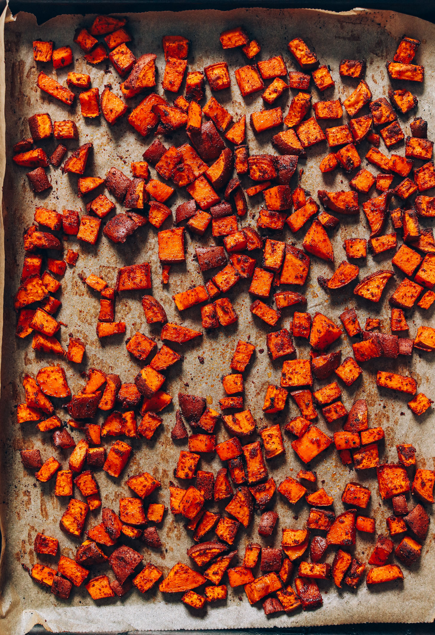 Baking sheet of tender Roasted Sweet Potato Croutons with BBQ seasonings