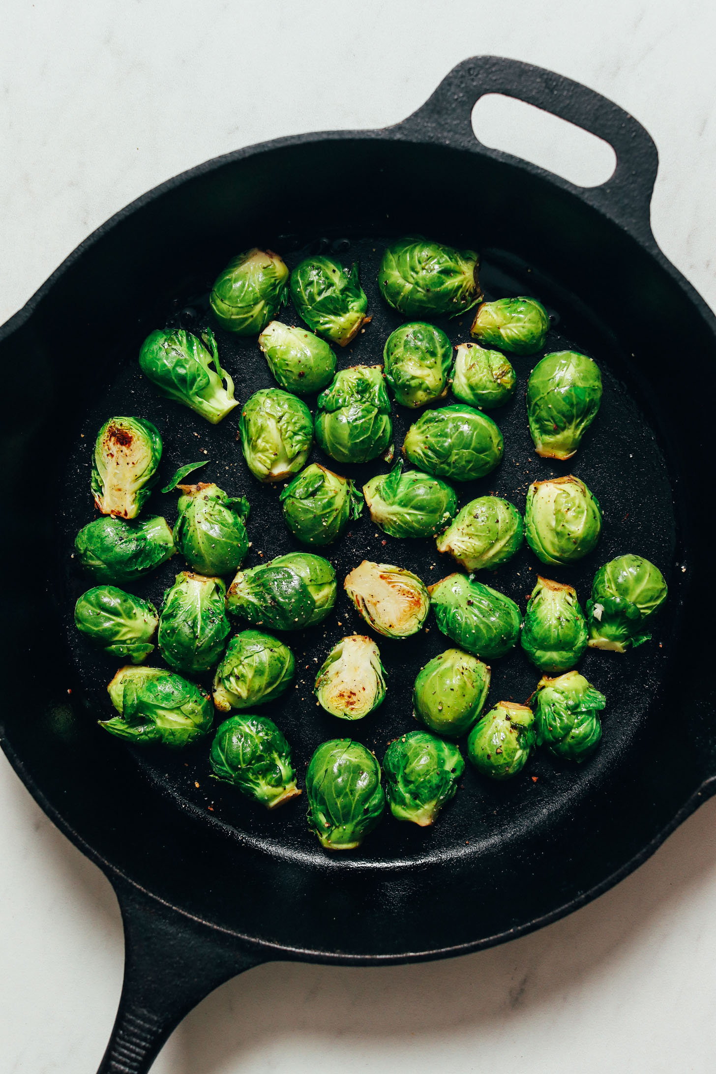 Cooking Brussels sprouts in a cast iron skillet