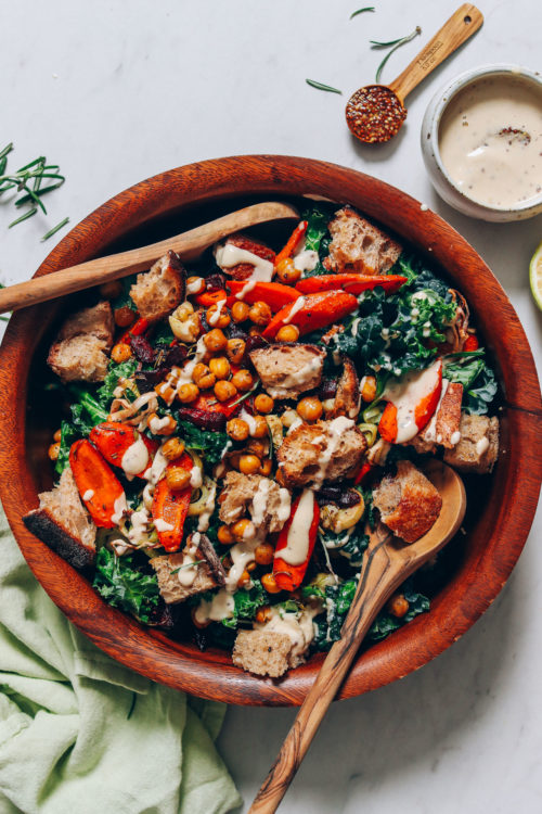 Wood bowl of our Fall Vegetable Panzanella made with tahini dressing