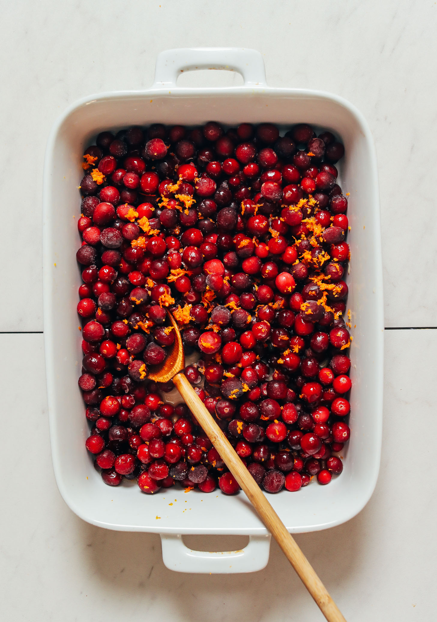Baking dish of cranberries and orange zest