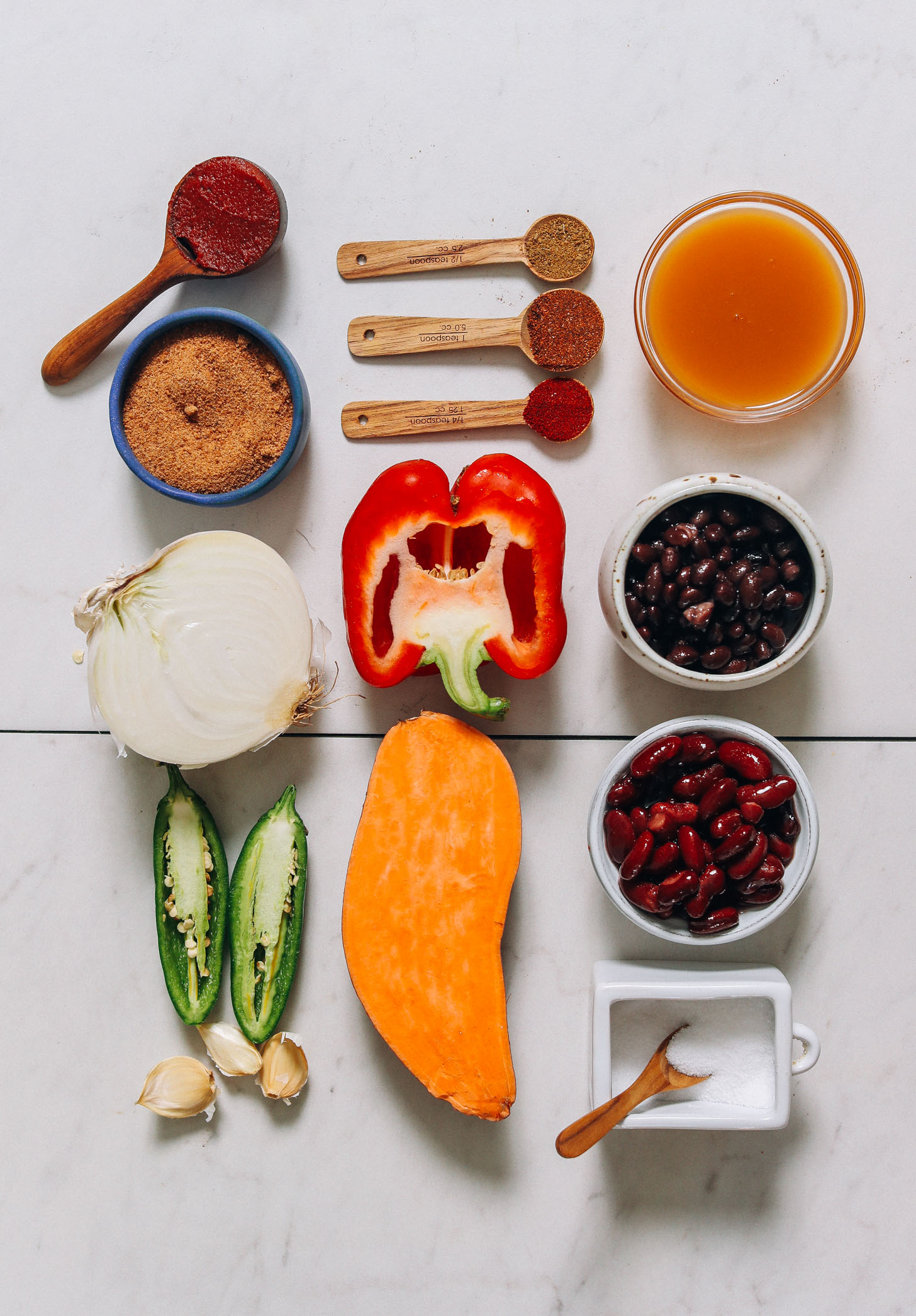 Tomato paste, spices, broth, beans, salt, and vegetables