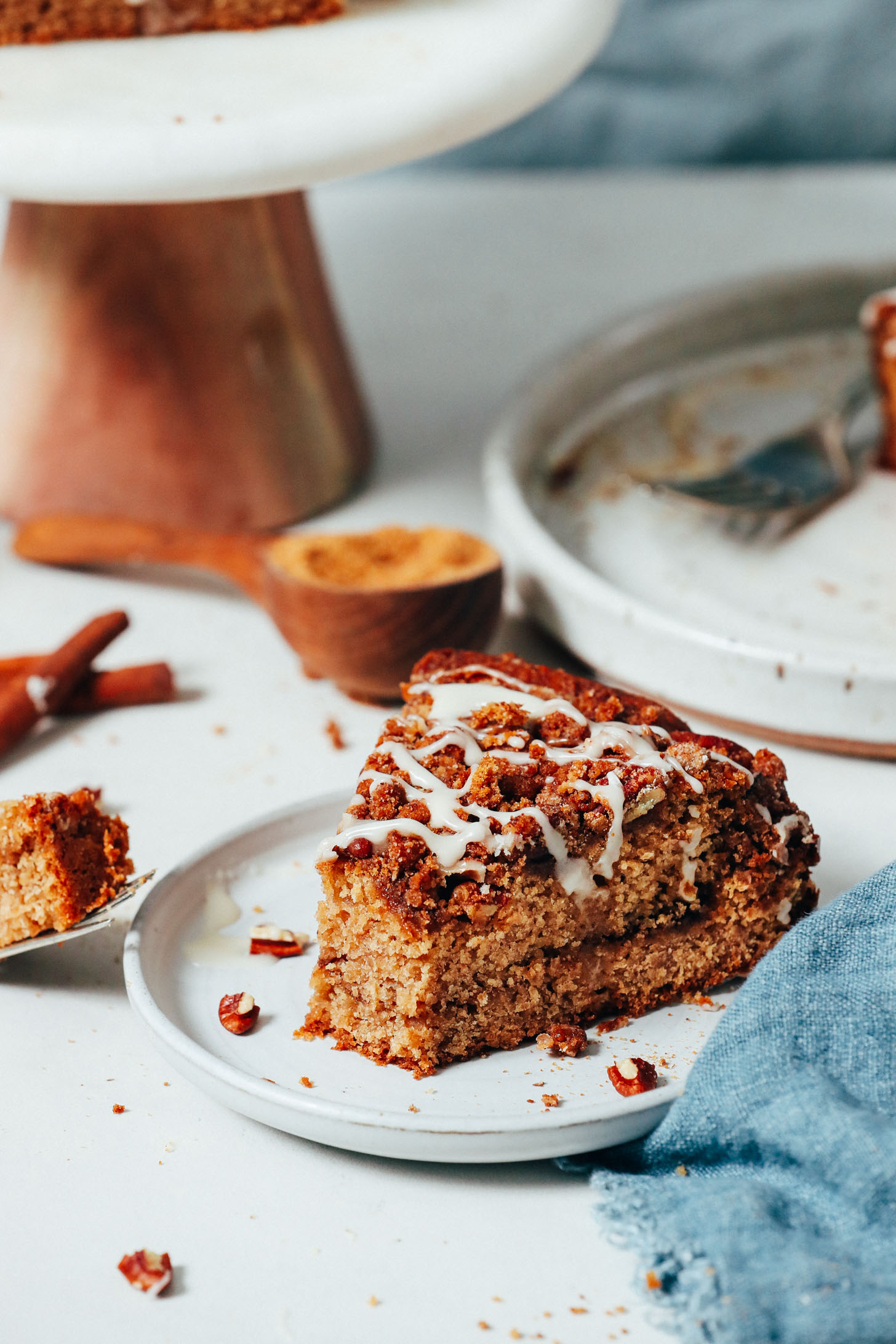 Close up shot of a fork and plate of vegan gluten-free coffee cake
