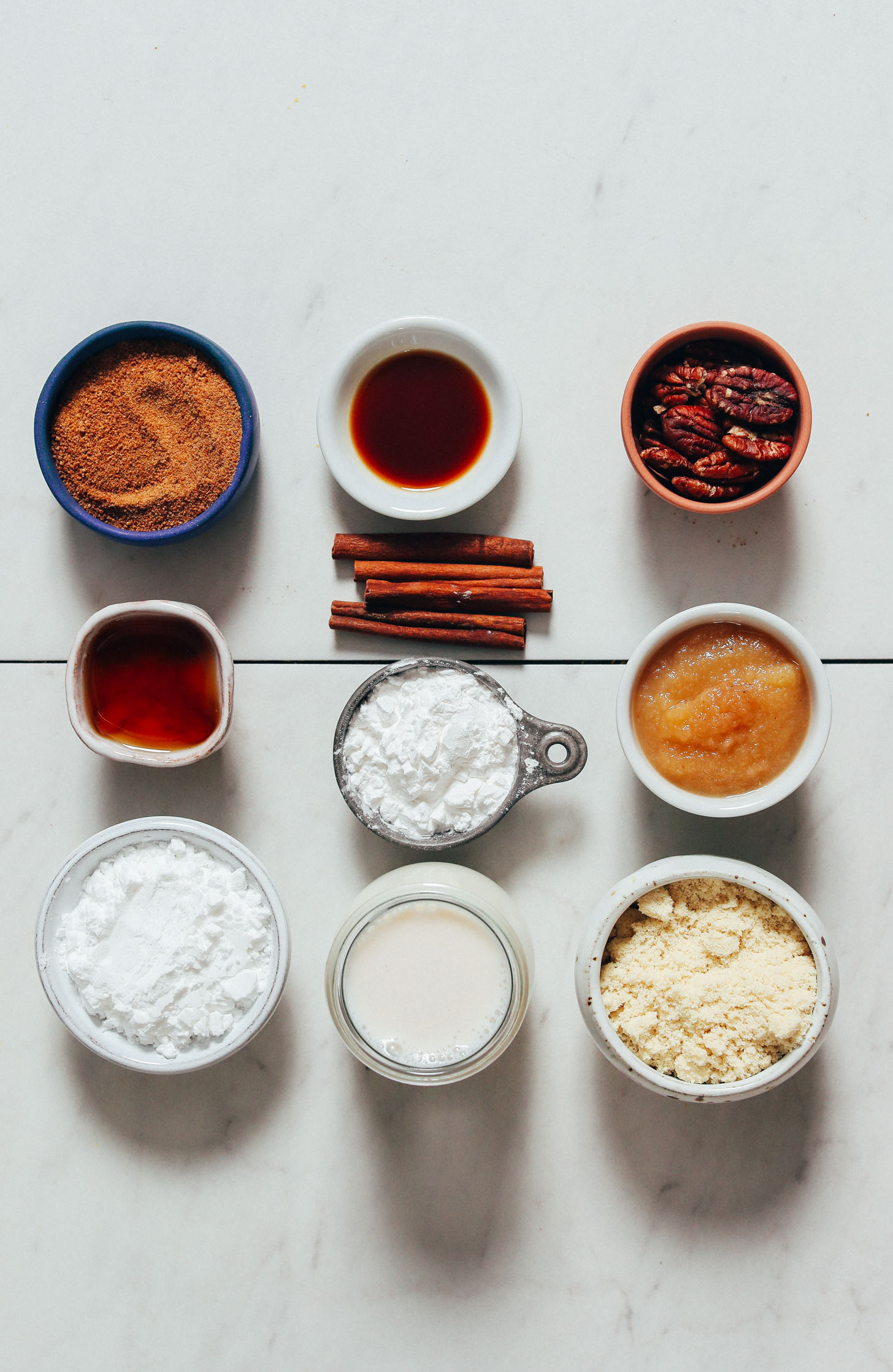 Coconut sugar, vanilla, pecans, cinnamon, maple syrup, applesauce, dairy-free milk, and gluten-free flours