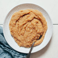 Spoon resting in a bowl of amaranth made in the Instant Pot