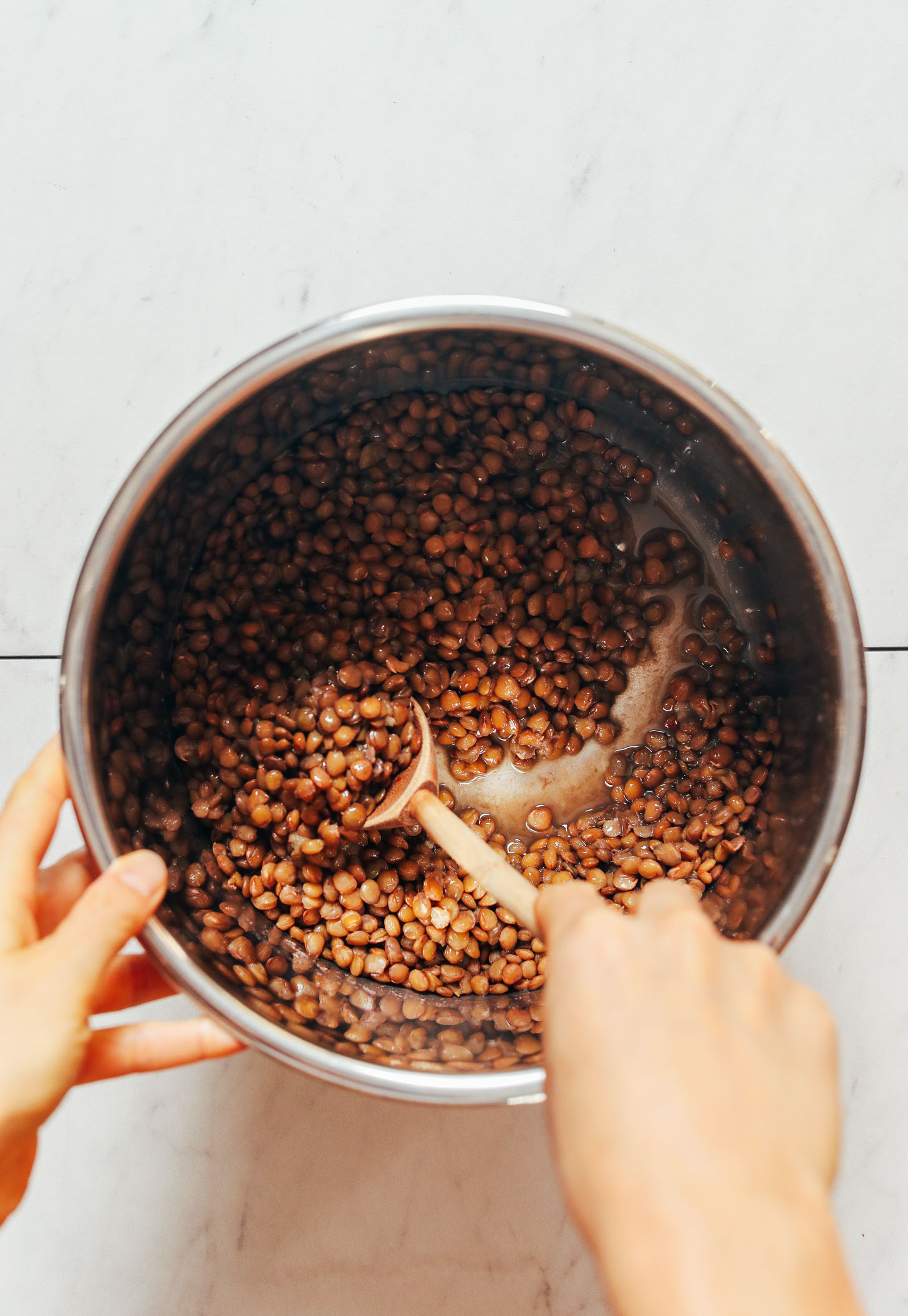 Stirring cooked lentils in the Instant Pot
