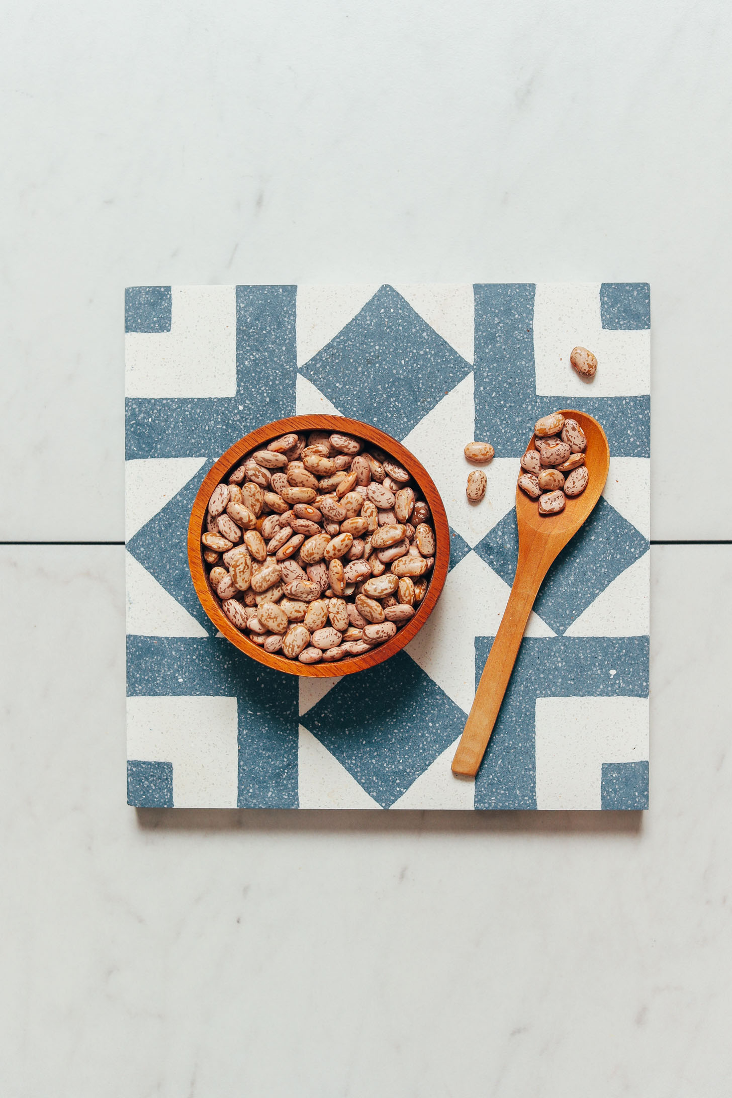 Spoon and bowl of Instant Pot pinto beans