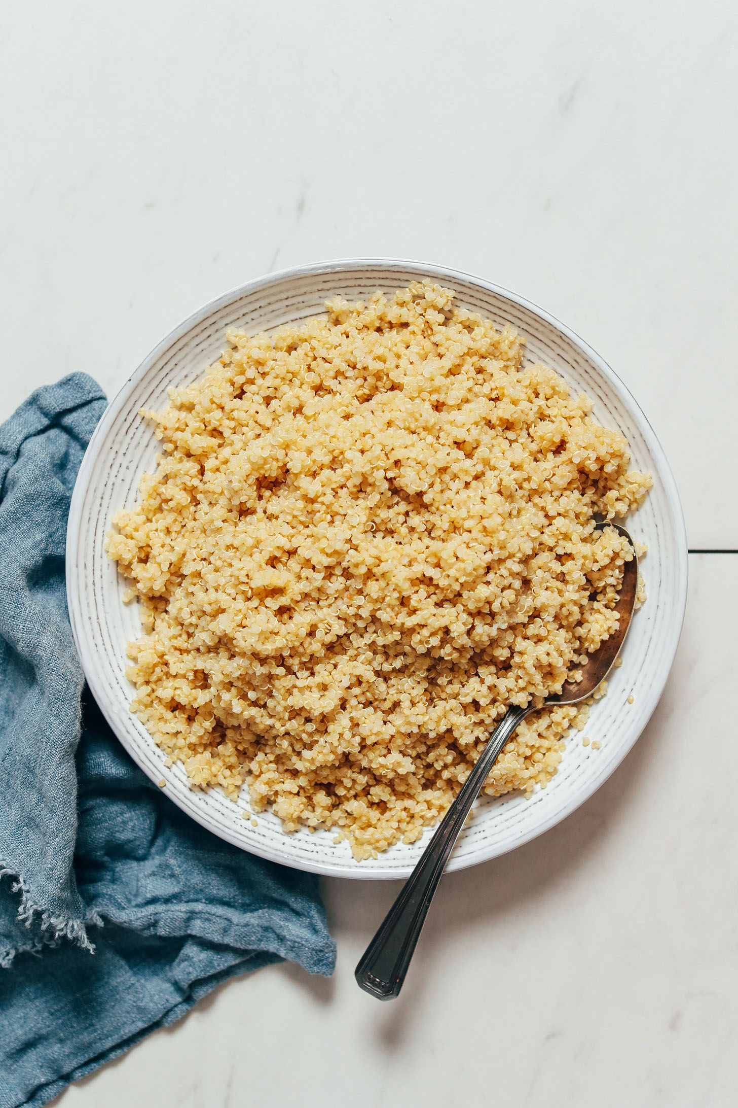Vintage spoon in a bowl of Instant Pot quinoa