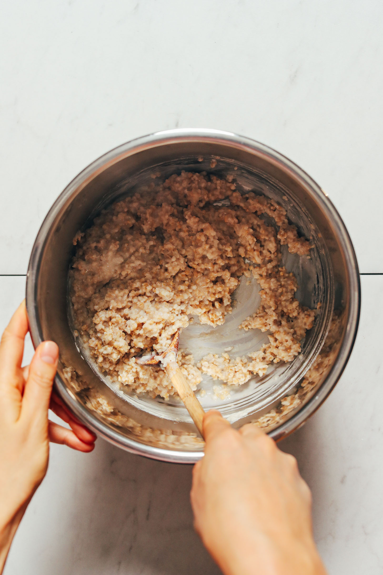 Stirring perfectly cooked steel cut oats in the Instant Pot
