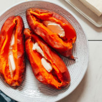 Bowl of Instant Pot sweet potatoes with vegan butter