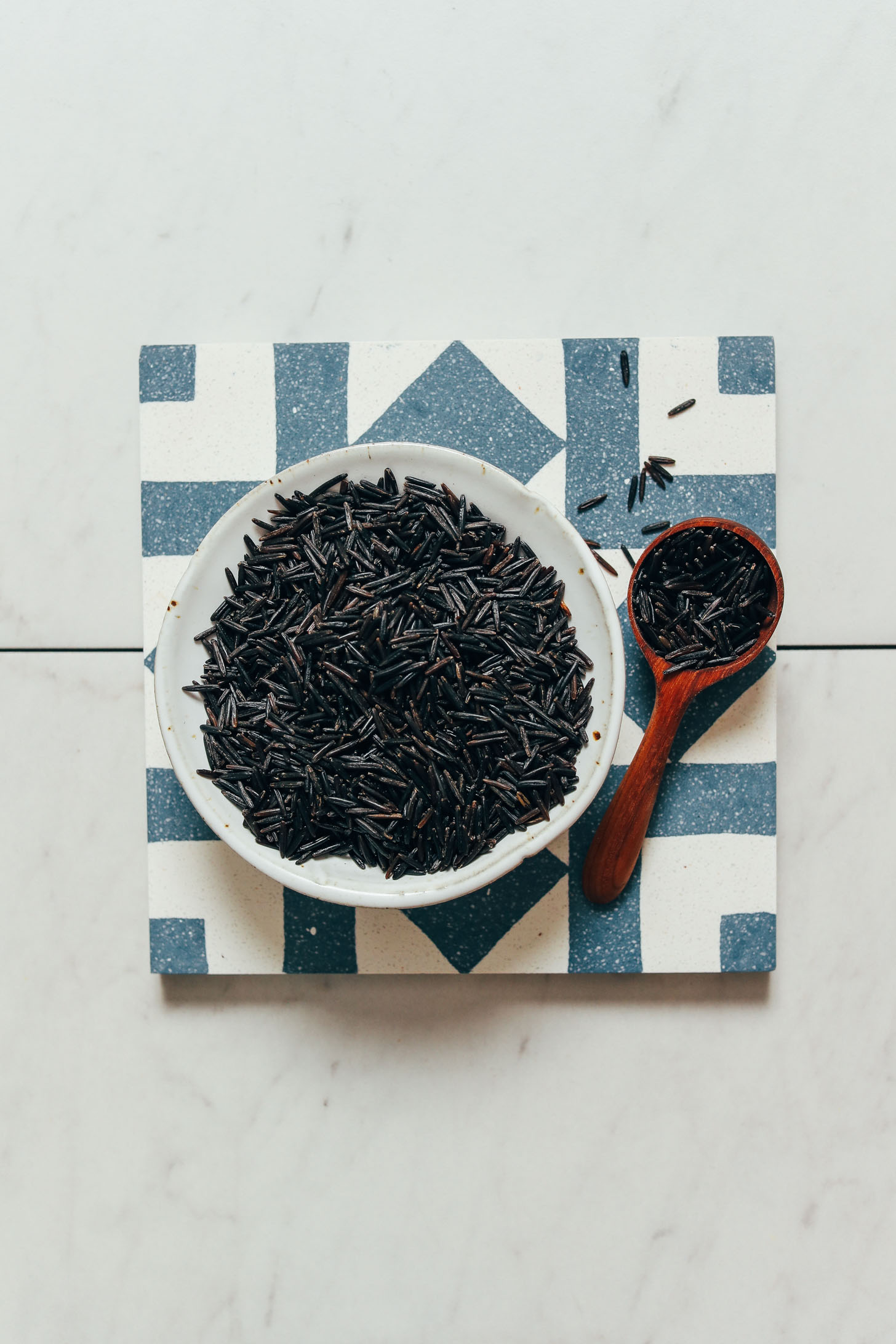 Bowl and spoon of dry wild rice