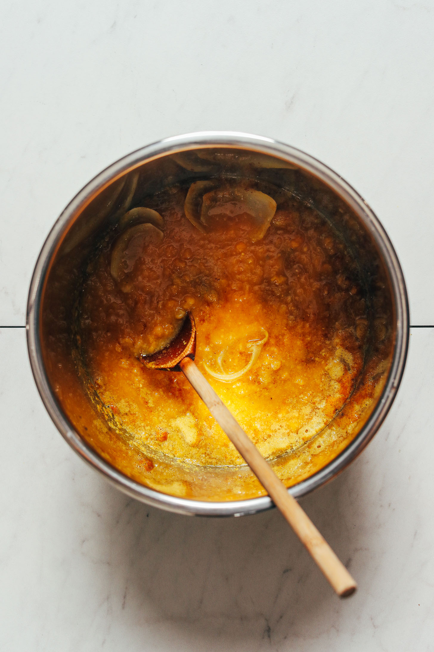 Instant Pot with cooked yellow split peas and seasonings