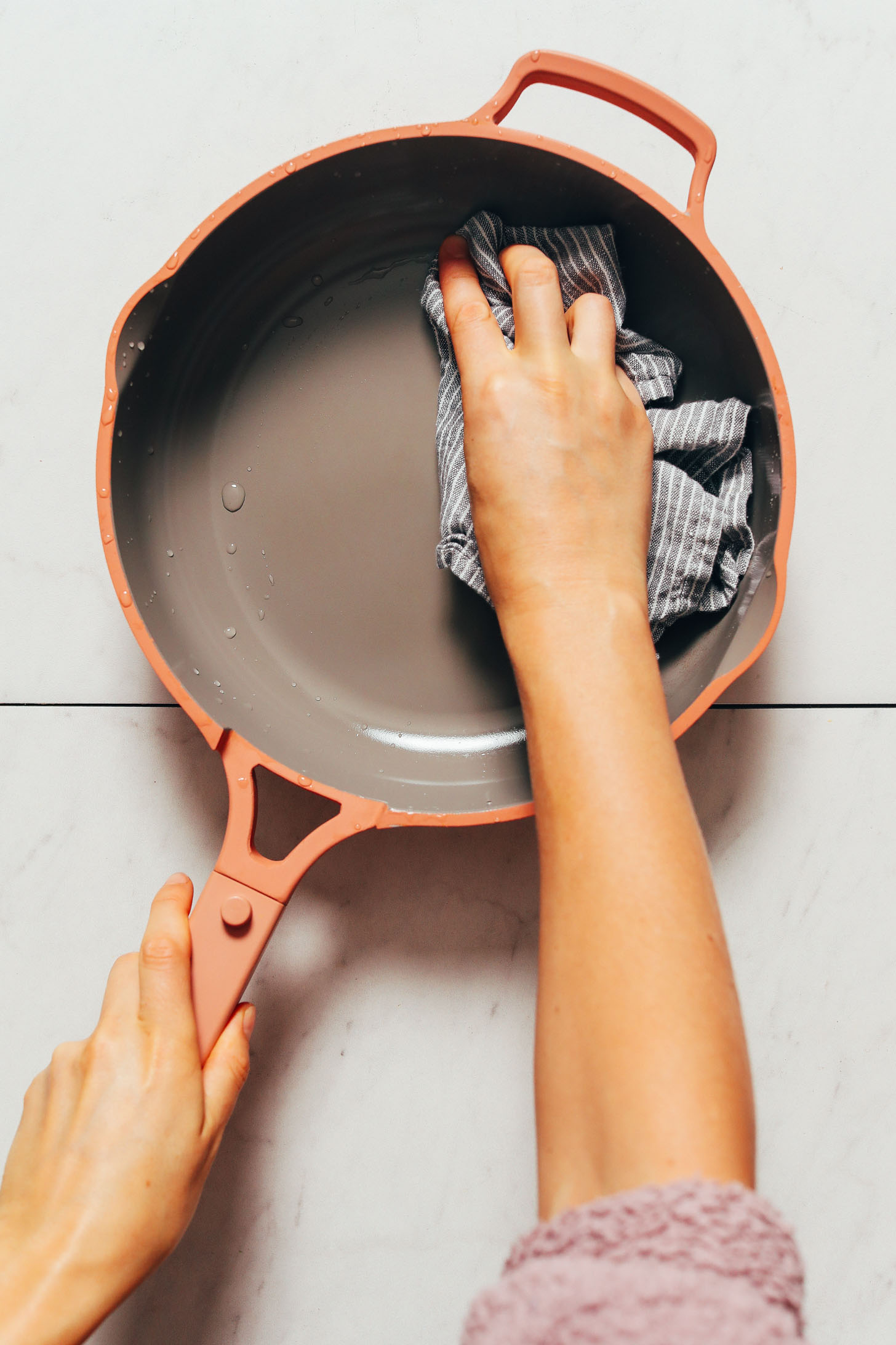 Drying the Always Pan with a dish towel