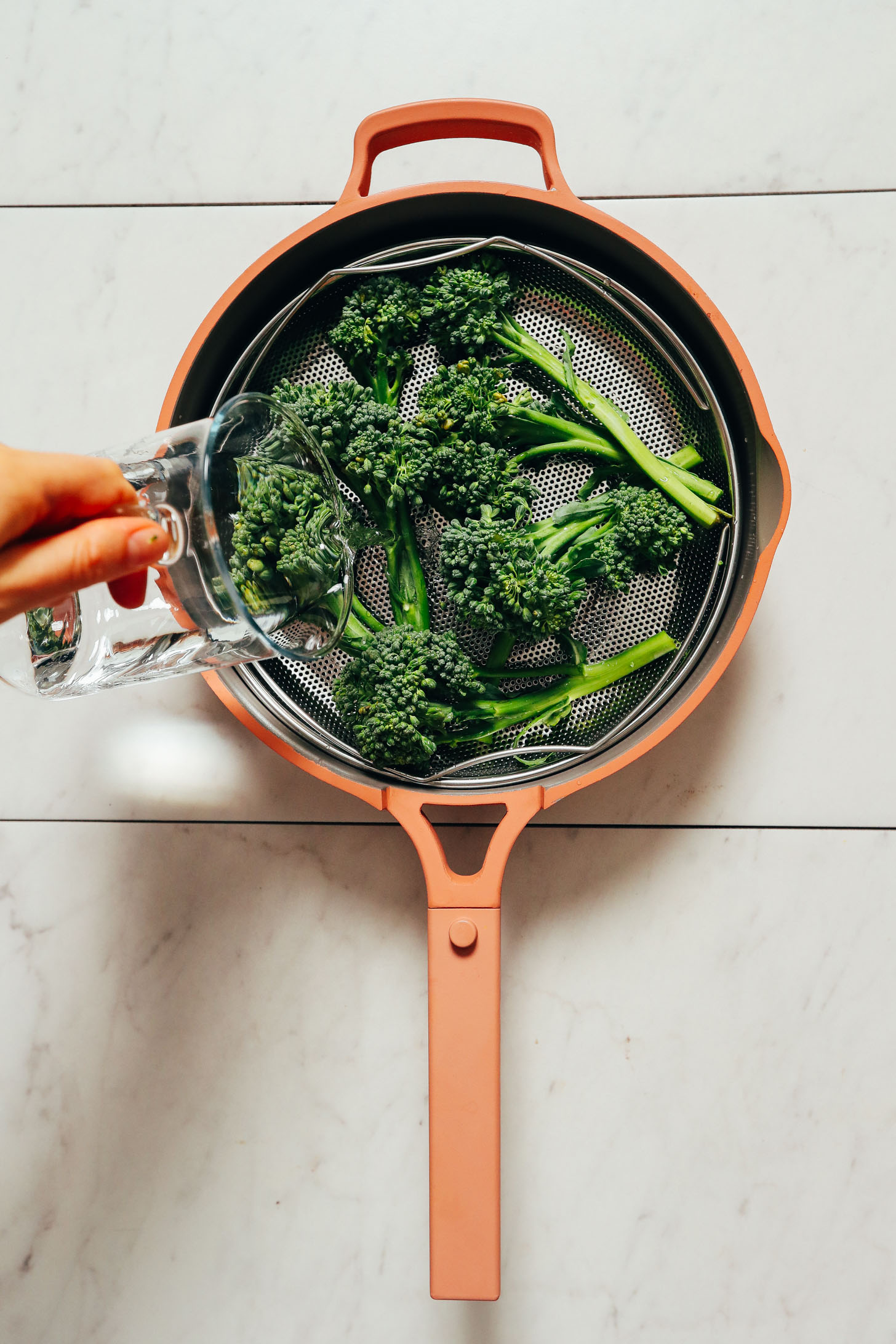 Showing the steamer basket in the Always Pan
