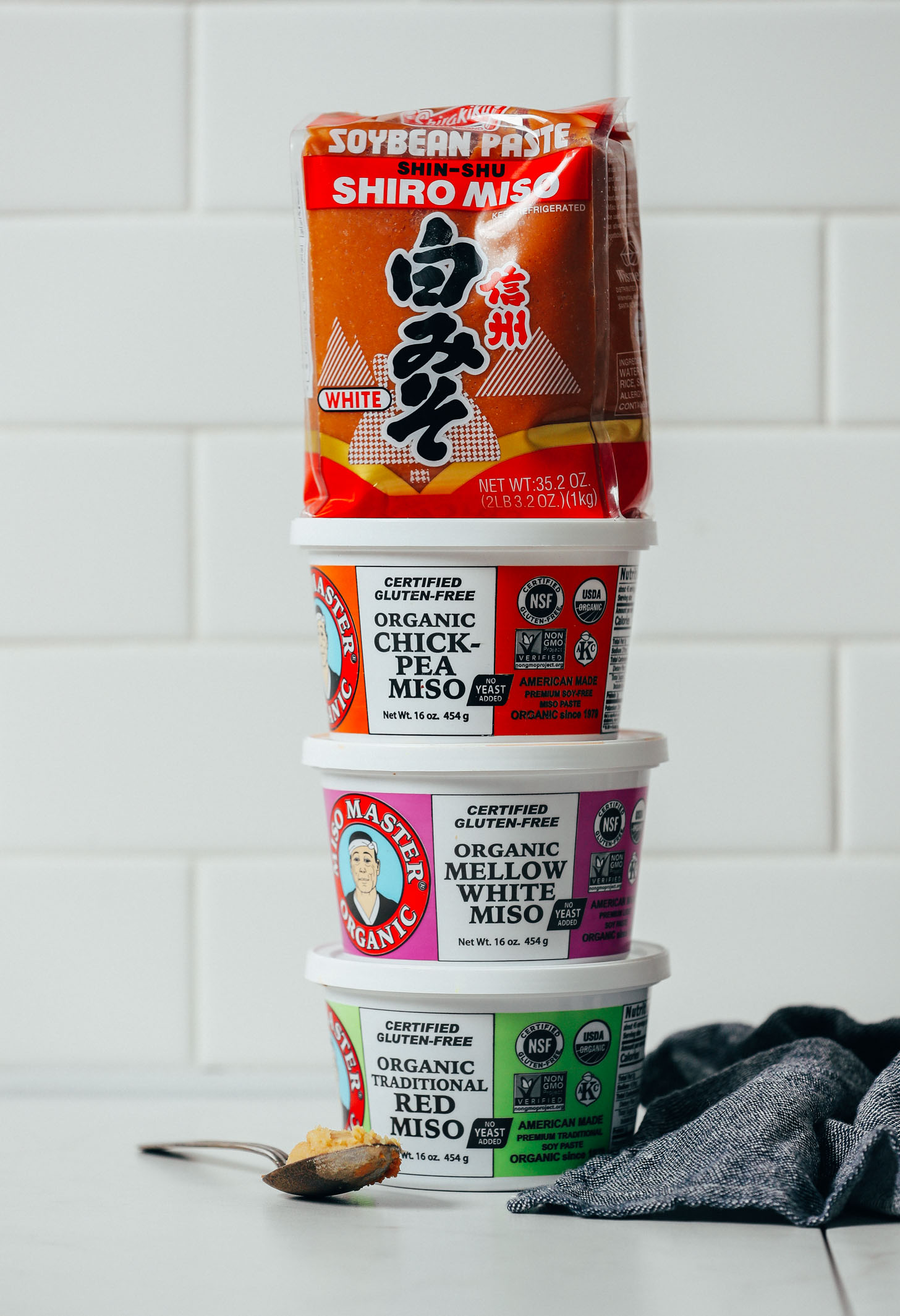 Tubs of white, chickpea, and red miso
