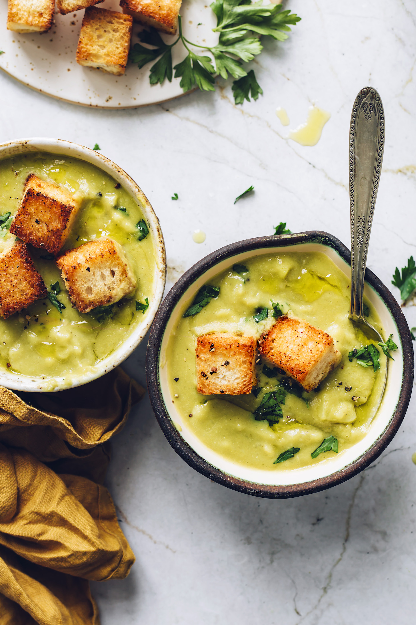 Two bowls of creamy Instant Pot green split pea soup