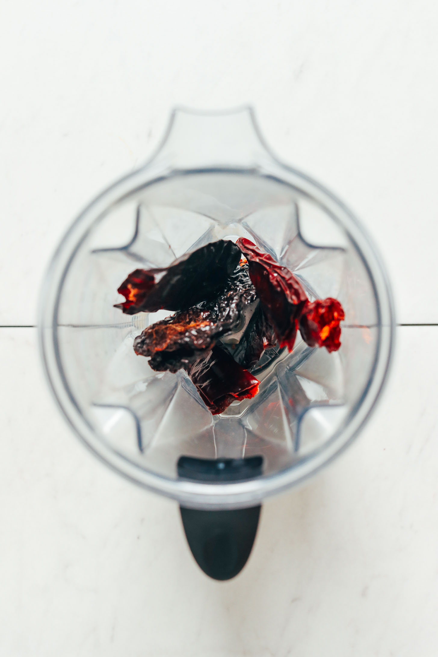 Toasted dried chilies in a blender for making chili powder