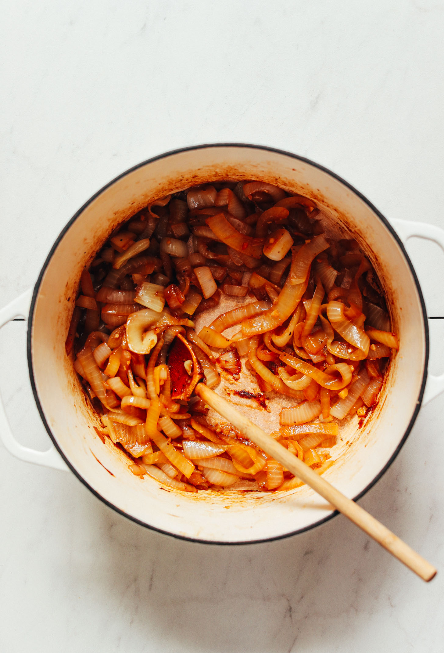 Dutch oven filled with caramelized onions