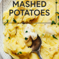 Spoon in a bowl of mashed potatoes made in the Instant Pot