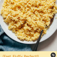 Spoon in a bowl of perfectly cooked millet