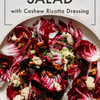 Large platter of vegan radicchio salad with candied nuts and cashew ricotta