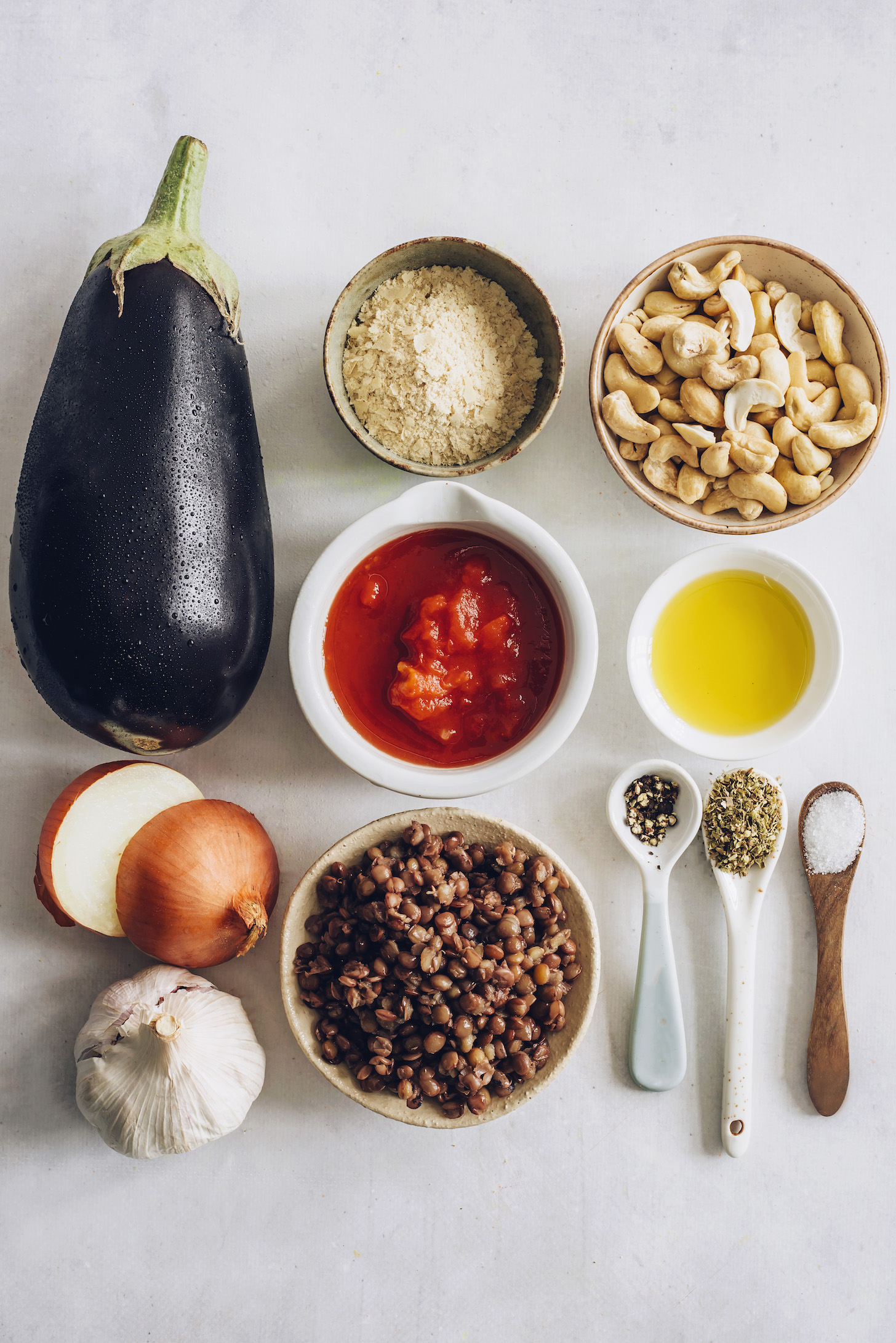 Eggplant, lentils, nutritional yeast, cashews, tomato, olive oil, onion, garlic, black pepper, oregano, and sea salt