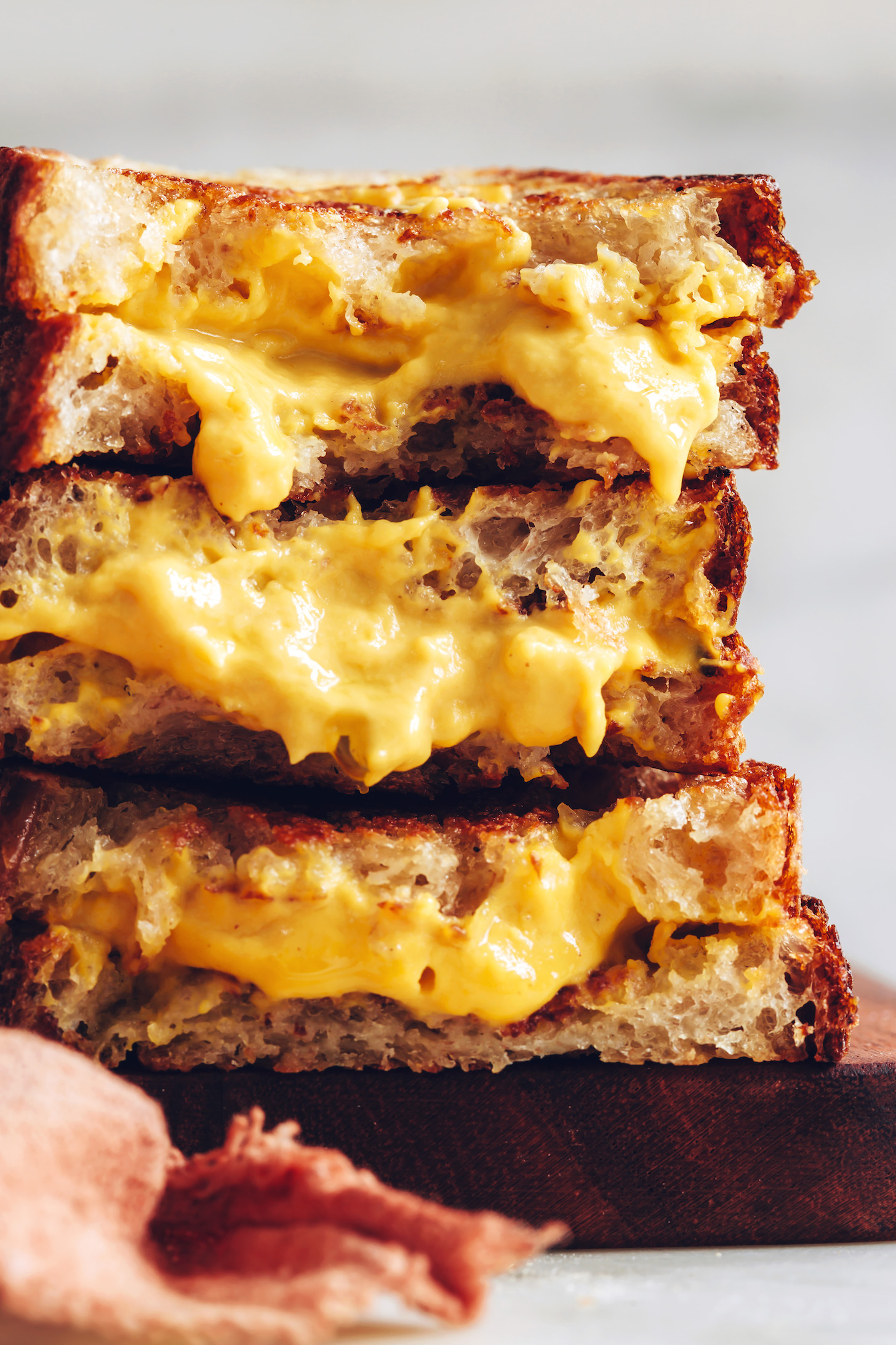 Stack of vegan grilled cheese sandwiches