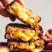 Stack of vegan grilled cheese sandwiches