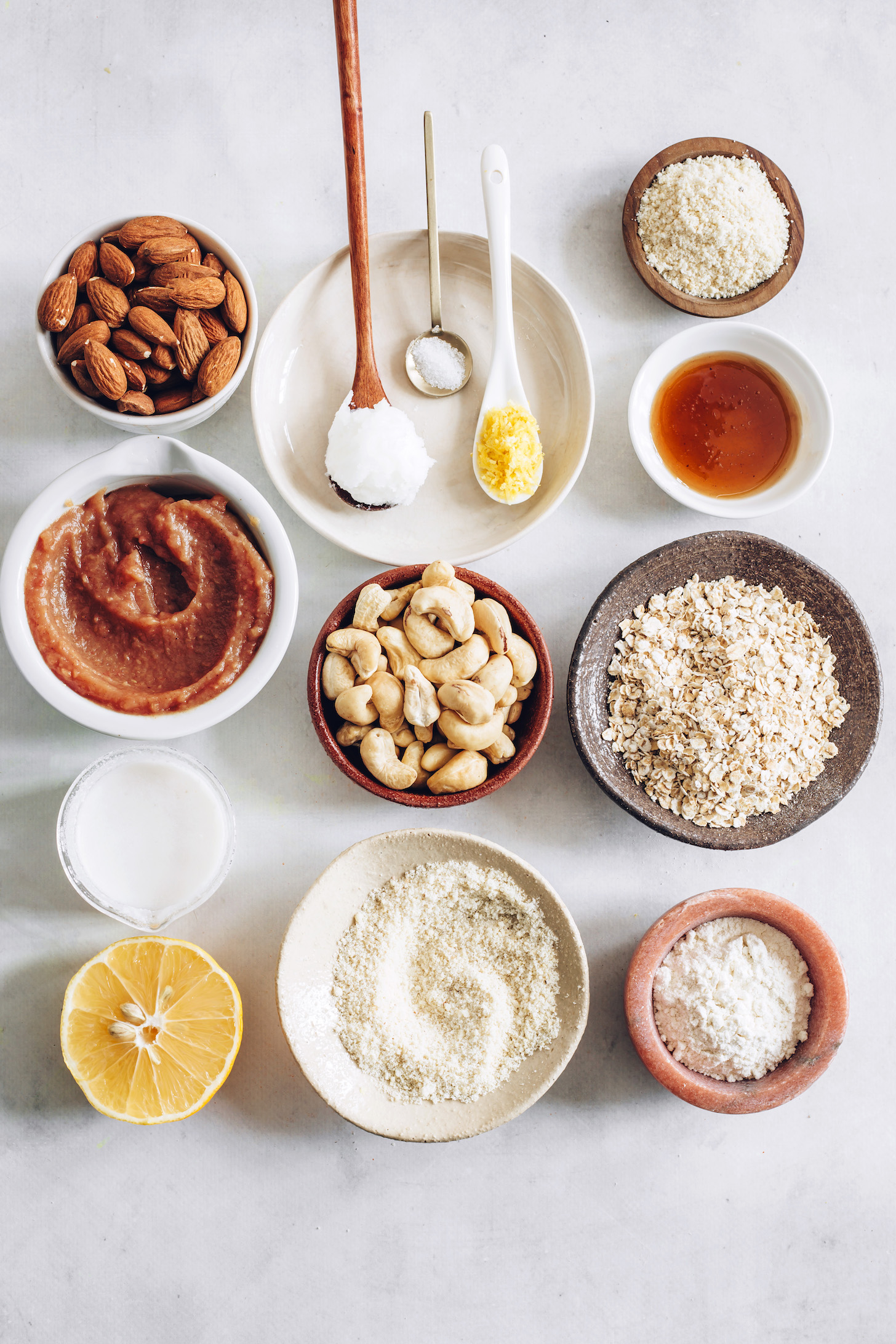 Almonds, apple butter, coconut cream, lemon, coconut oil, salt, cashews, almond flour, arrowroot starch, oats, and maple syrup