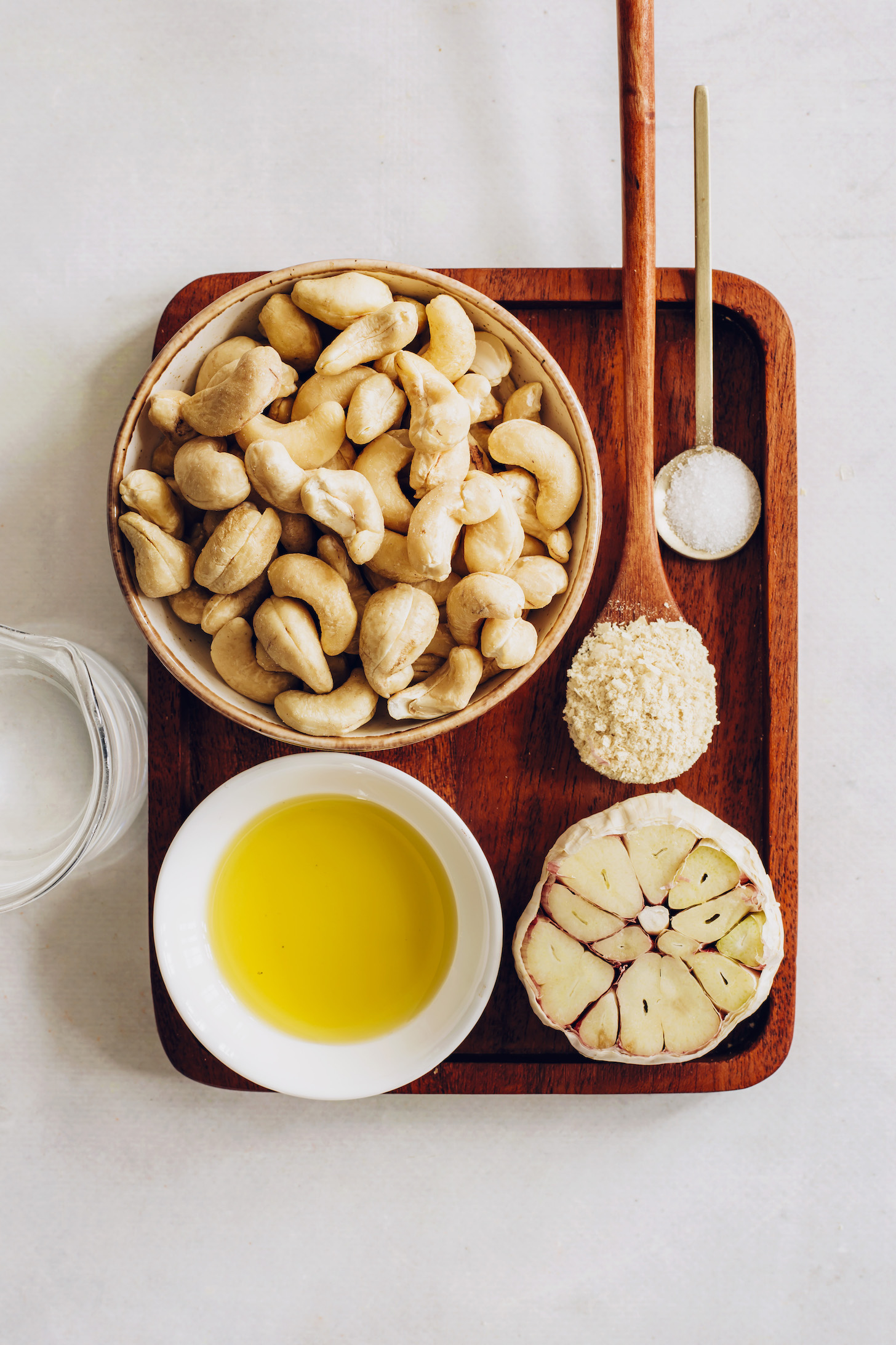 Cashews, nutritional yeast, sea salt, olive oil, and garlic