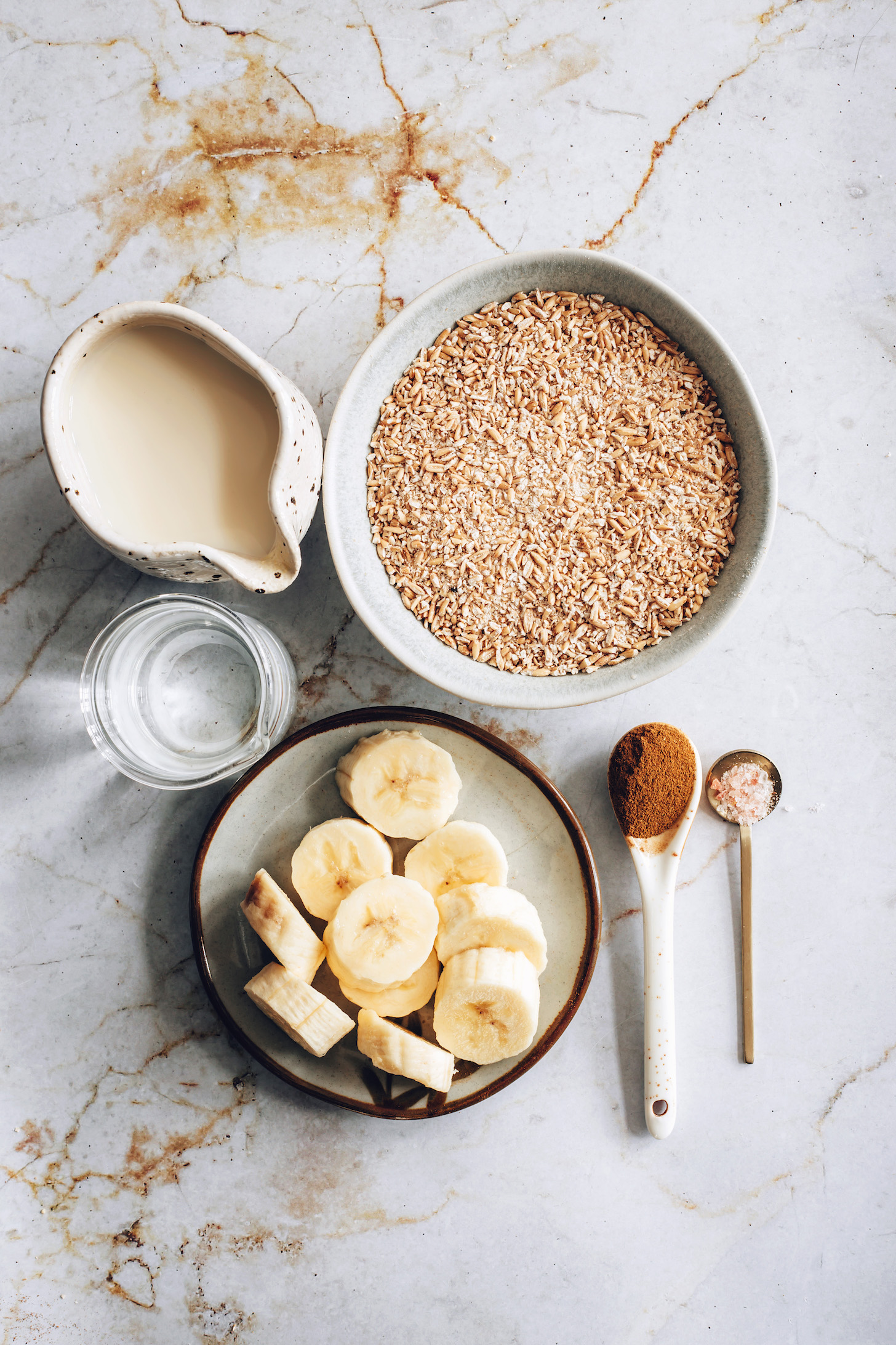 Steel cut oats, dairy-free milk, water, banana, cinnamon, and sea salt