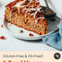 Slice of vegan coffee cake drizzled with glaze