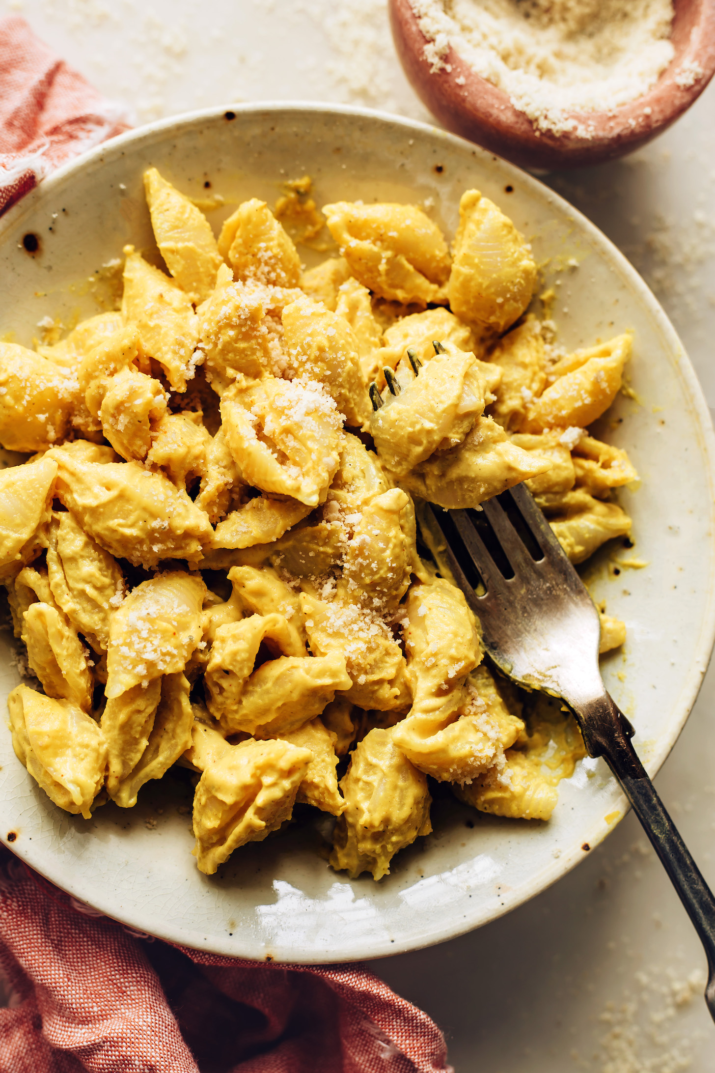 Fork in a bowl of gluten-free vegan mac and cheese