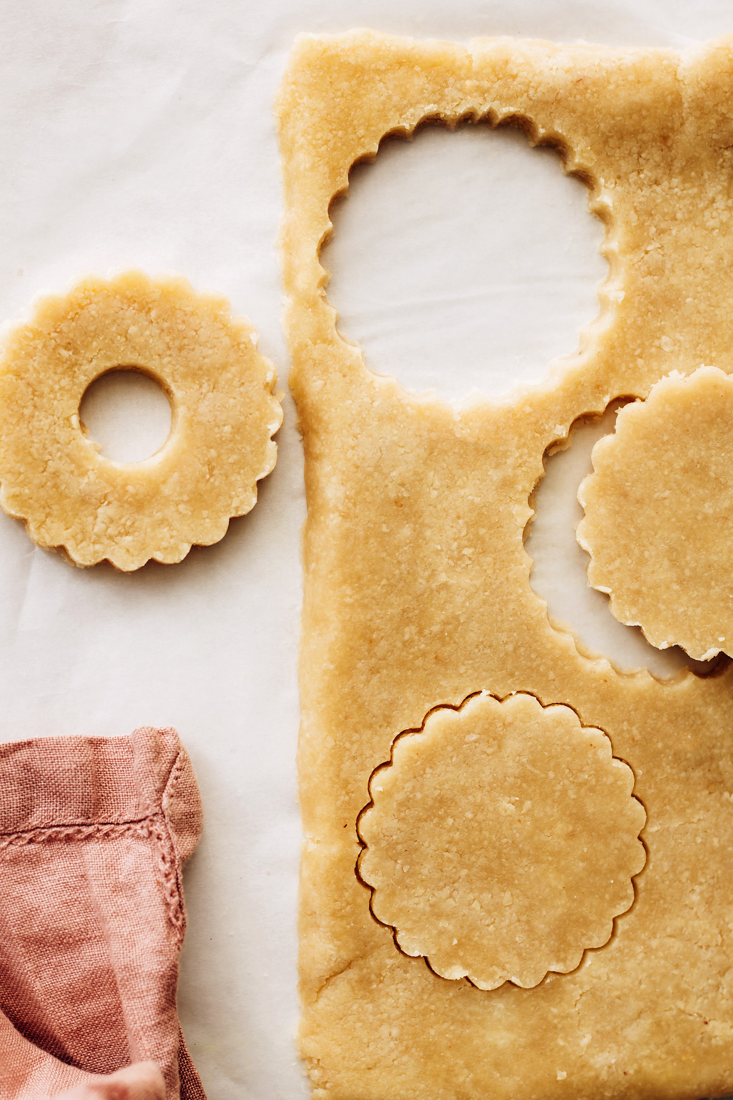 Rolled cookie dough cut with a cookie cutter