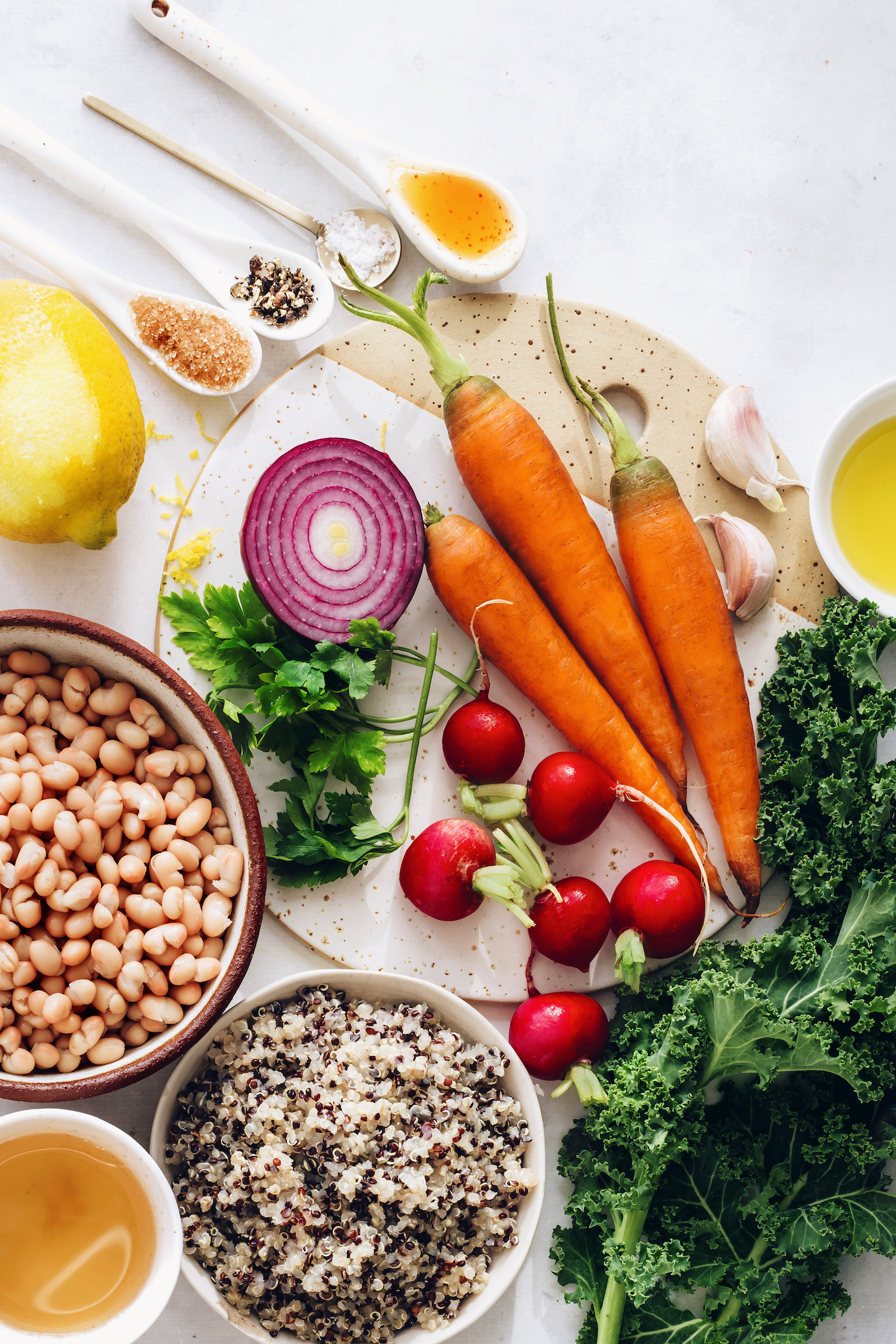 White beans, quinoa, fresh spring vegetables, garlic, lemon, olive oil, salt, pepper, and vinegar