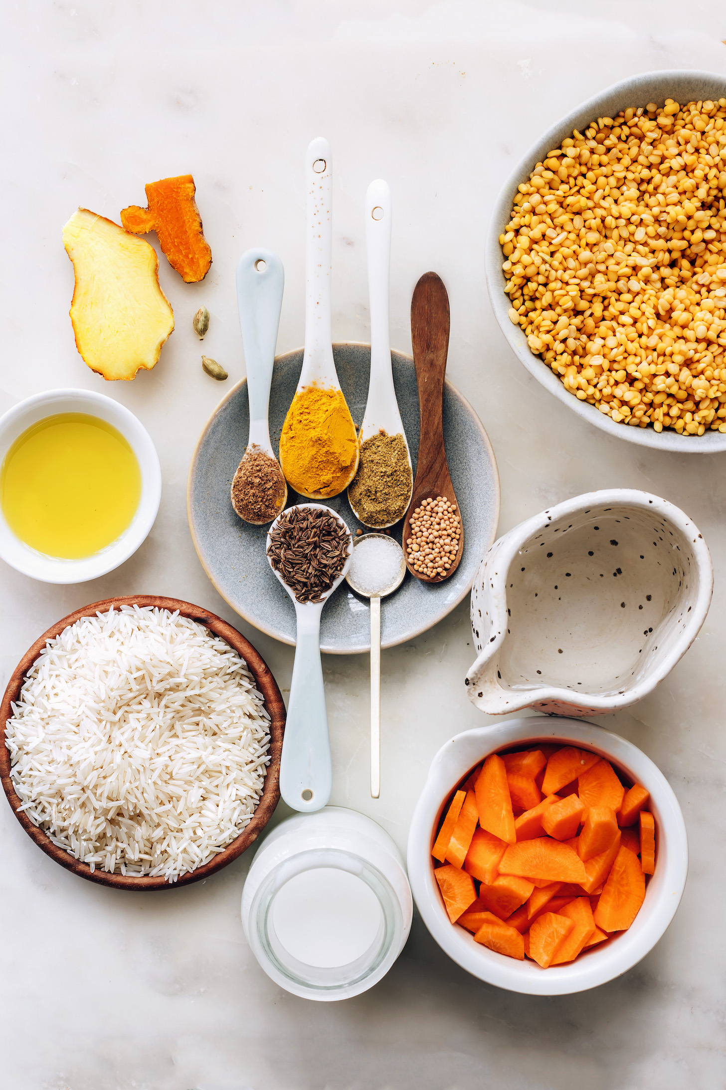 Spices, avocado oil, rice, coconut milk, carrots, water, and split yellow moong dal