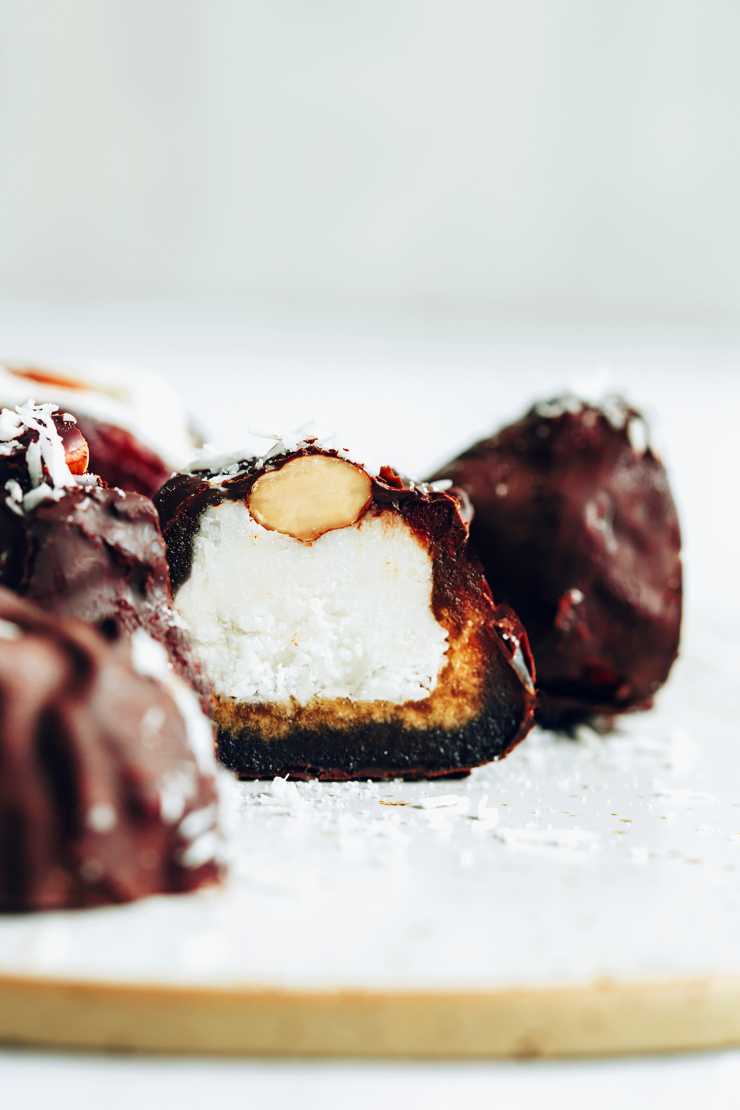 Side view of an almond joy stuffed date