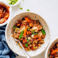 Bowl of Kimchi Fried Rice made with snap peas and carrots