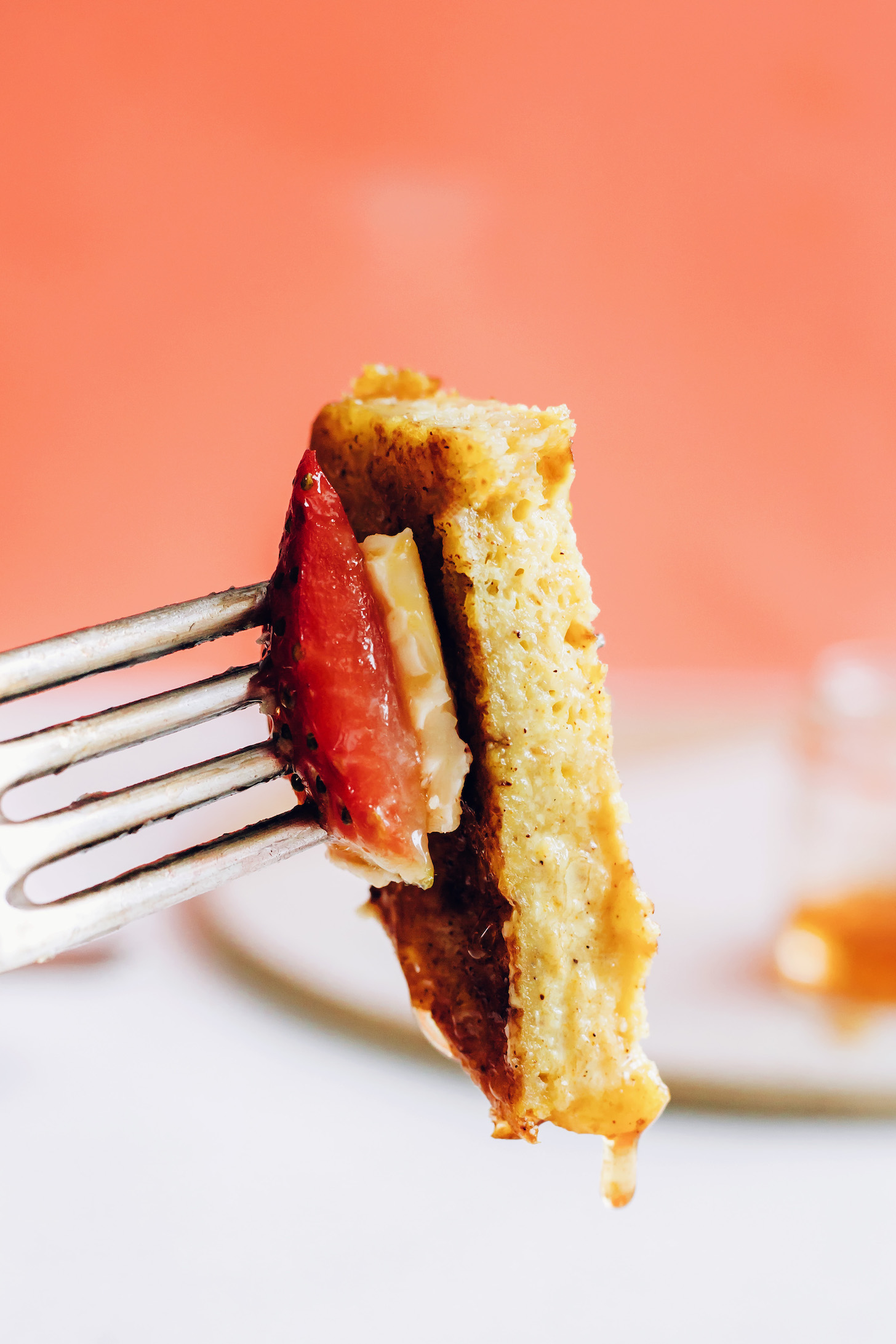 Close up shot of a bite of vegan French toast