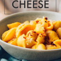 Holding a bowl of vegan mac and cheese