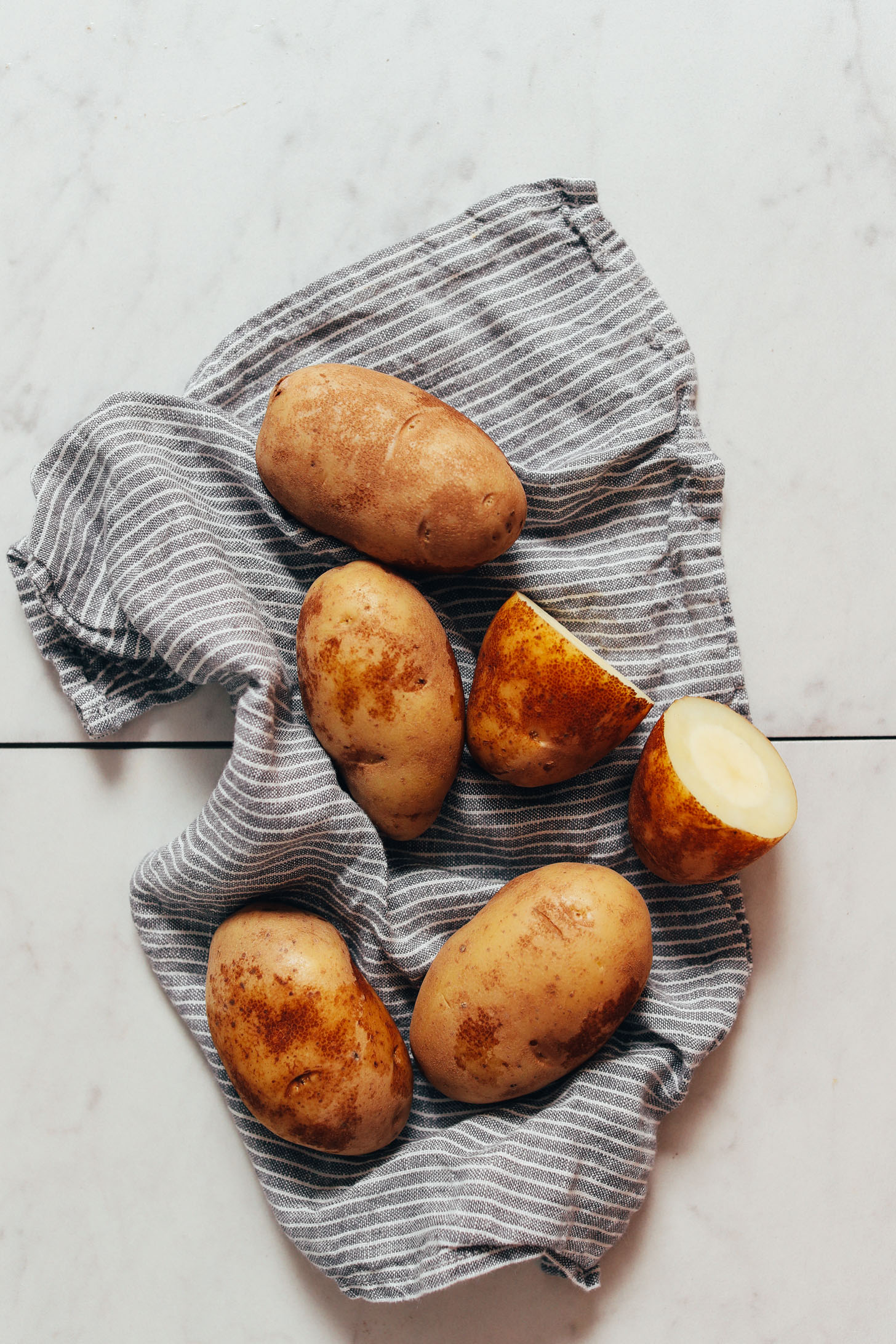 Partially cooked potatoes for making hash browns