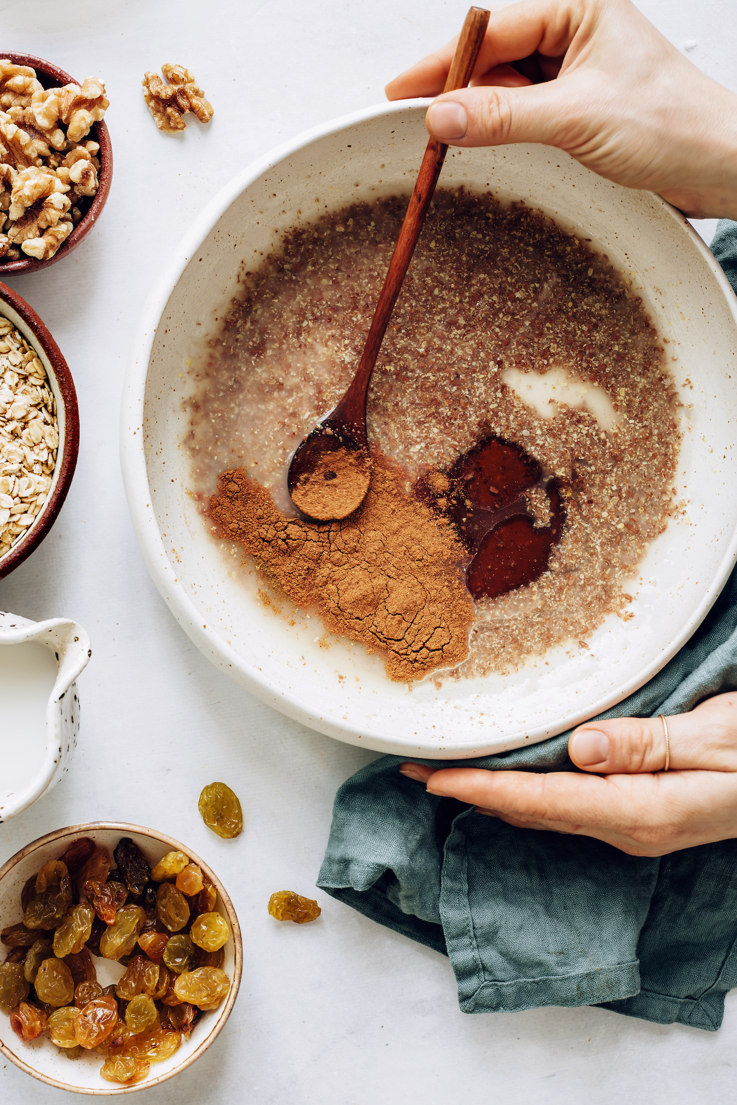 Bowl of flax eggs, cinnamon, maple syrup, oil, and dairy-free milk
